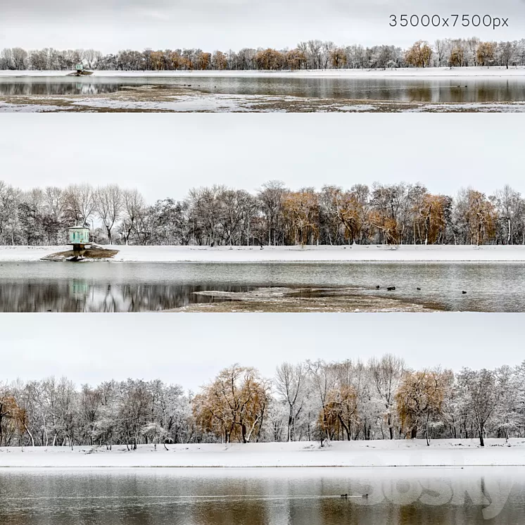 Panorama of the park with a lake and snow-covered trees. 35k